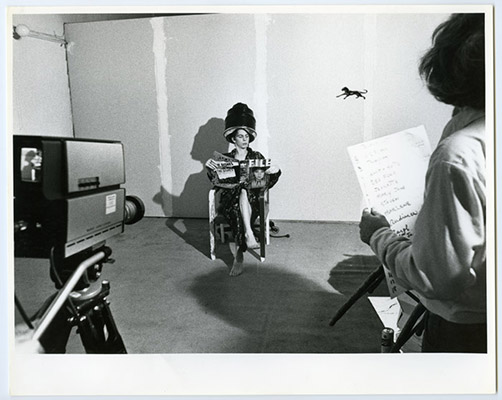 Robert Hackett reading File Magazine and unidentified participant with scene listing, High Profile Slow Scan performance, Video Inn, Vancouver and CN Tower, Toronto, October 13, 1978, Courtesy of Paul Wong